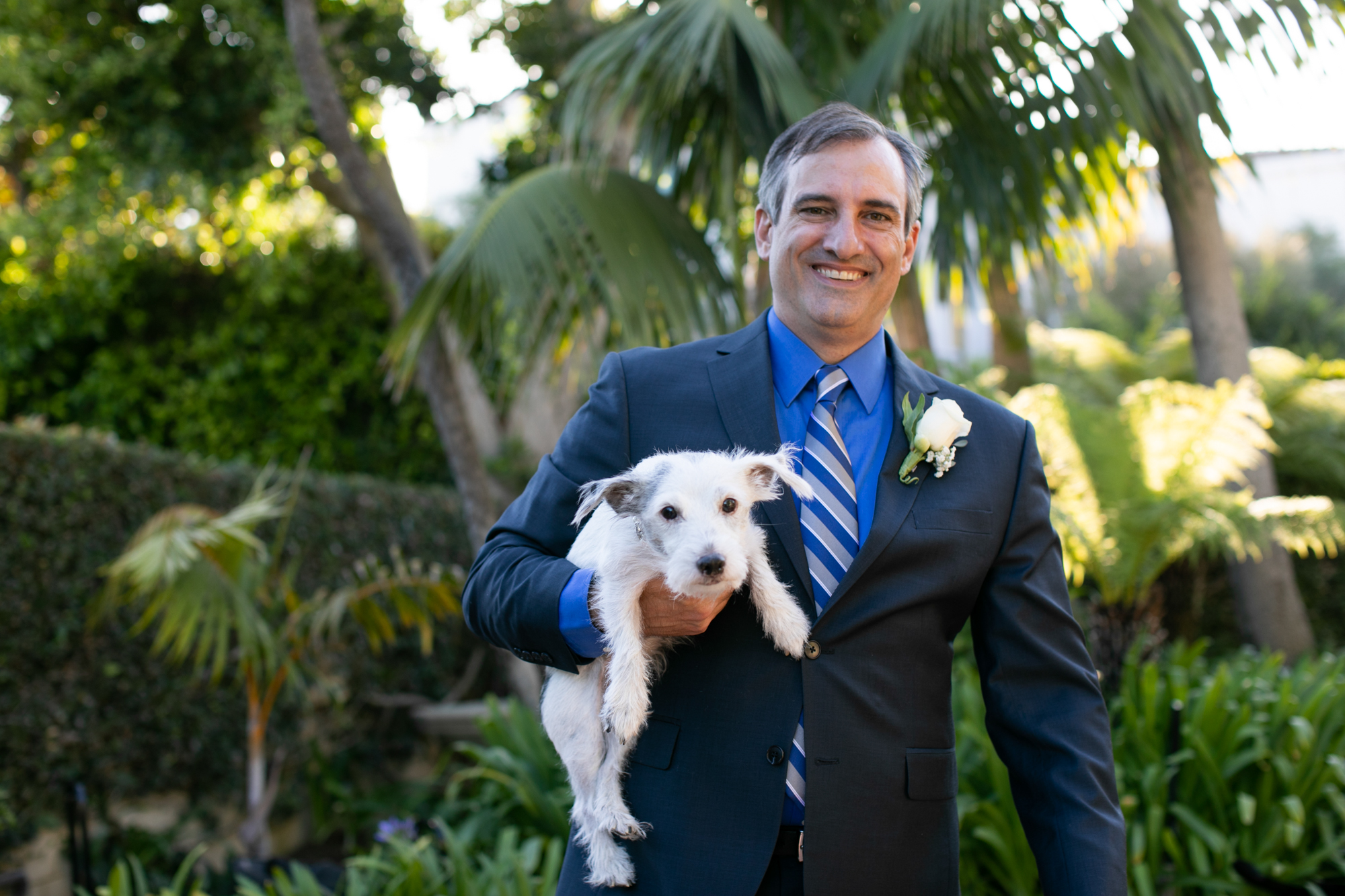 groom with dog los angeles photo