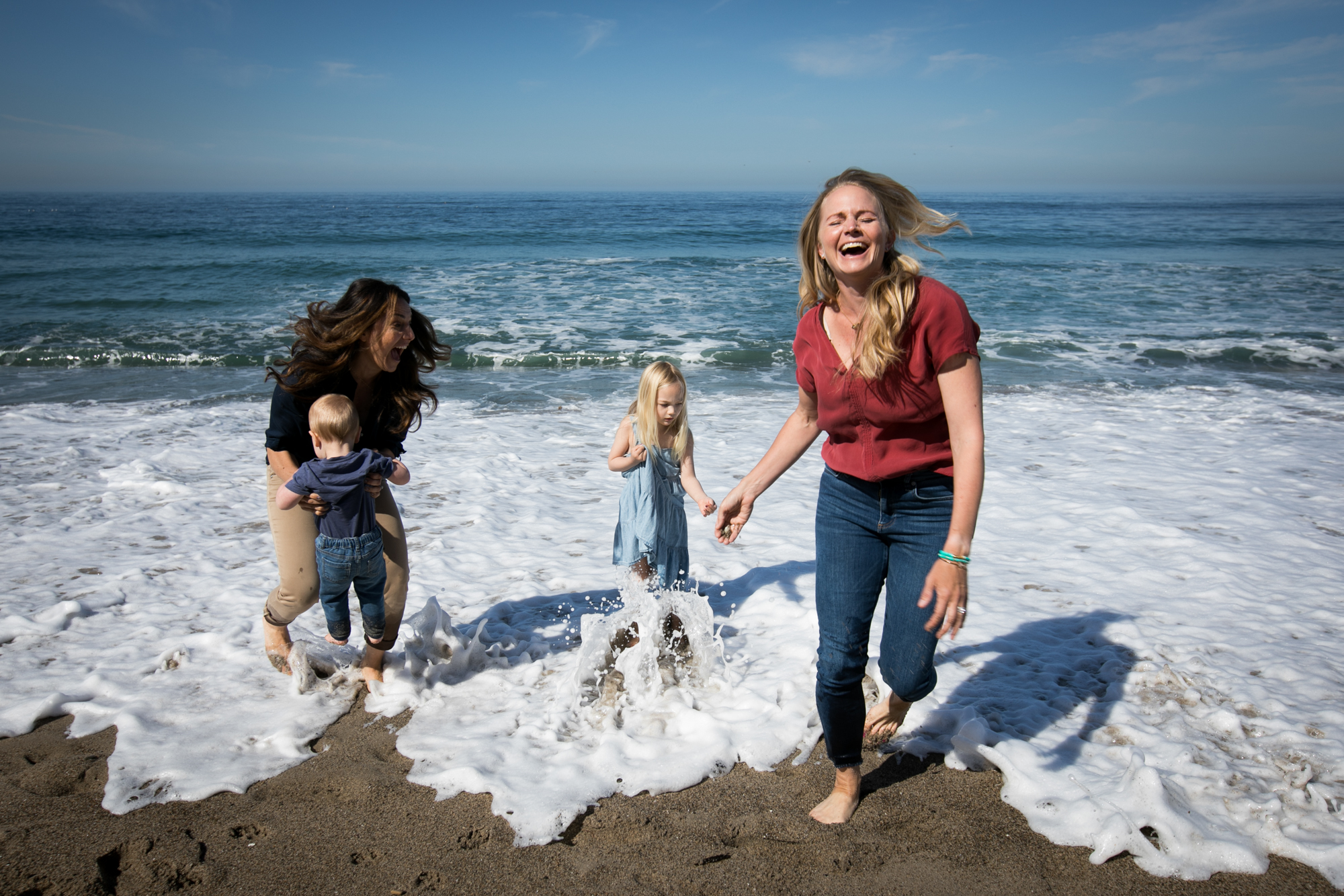 Family plays in the water at Leo Carrillo